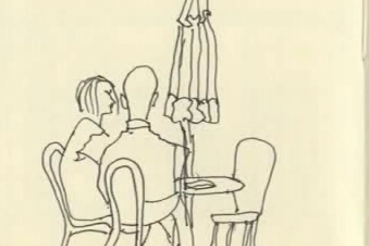 Two people at a café table