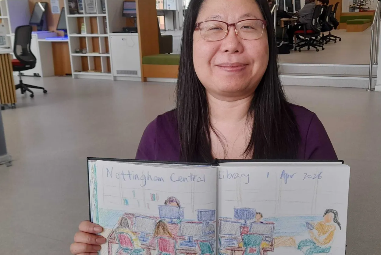 Woman with sketch books