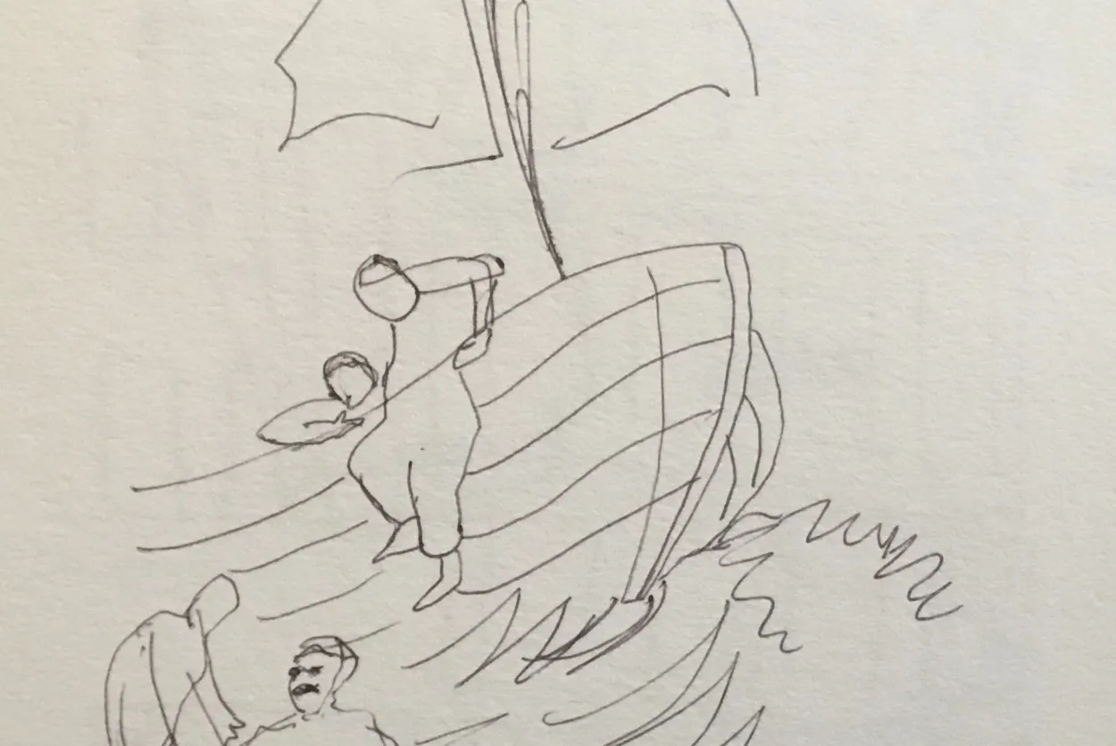 Man climbing out of boat
