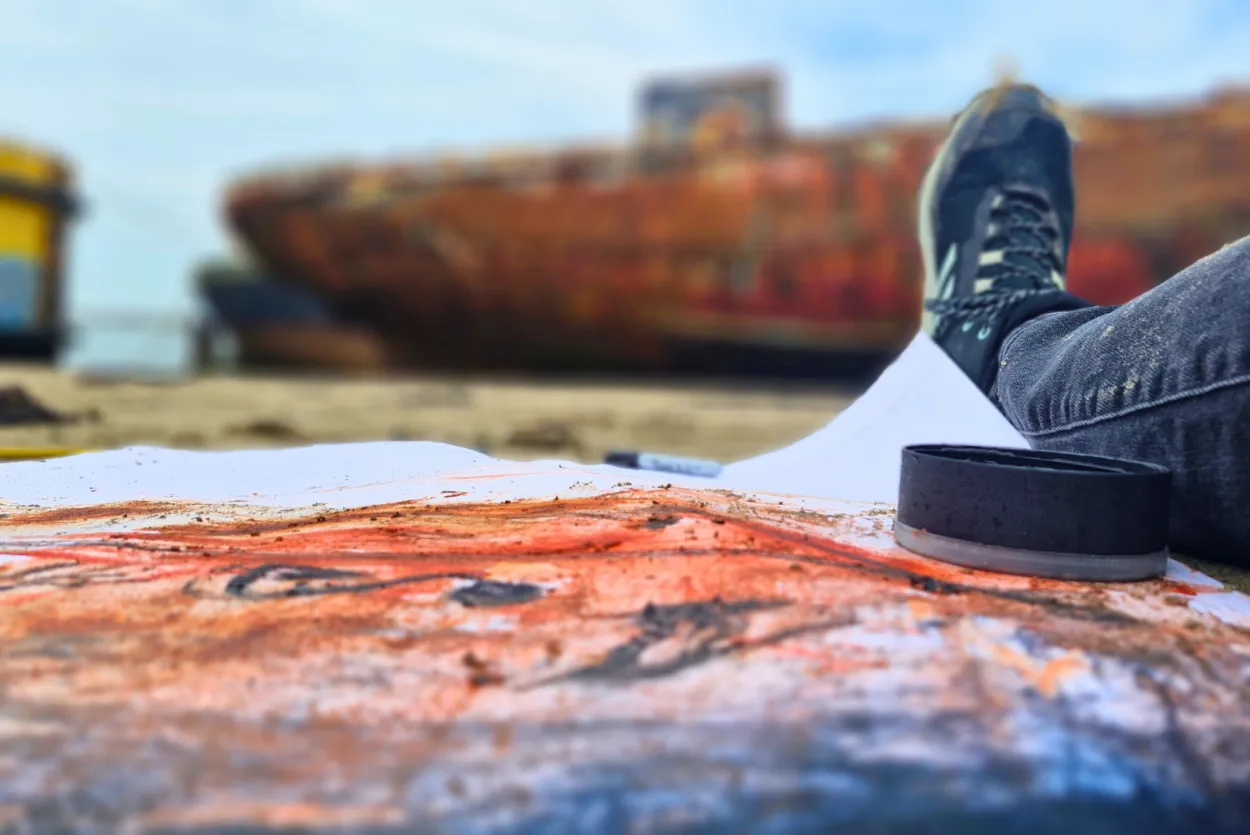 Sketching on the beach