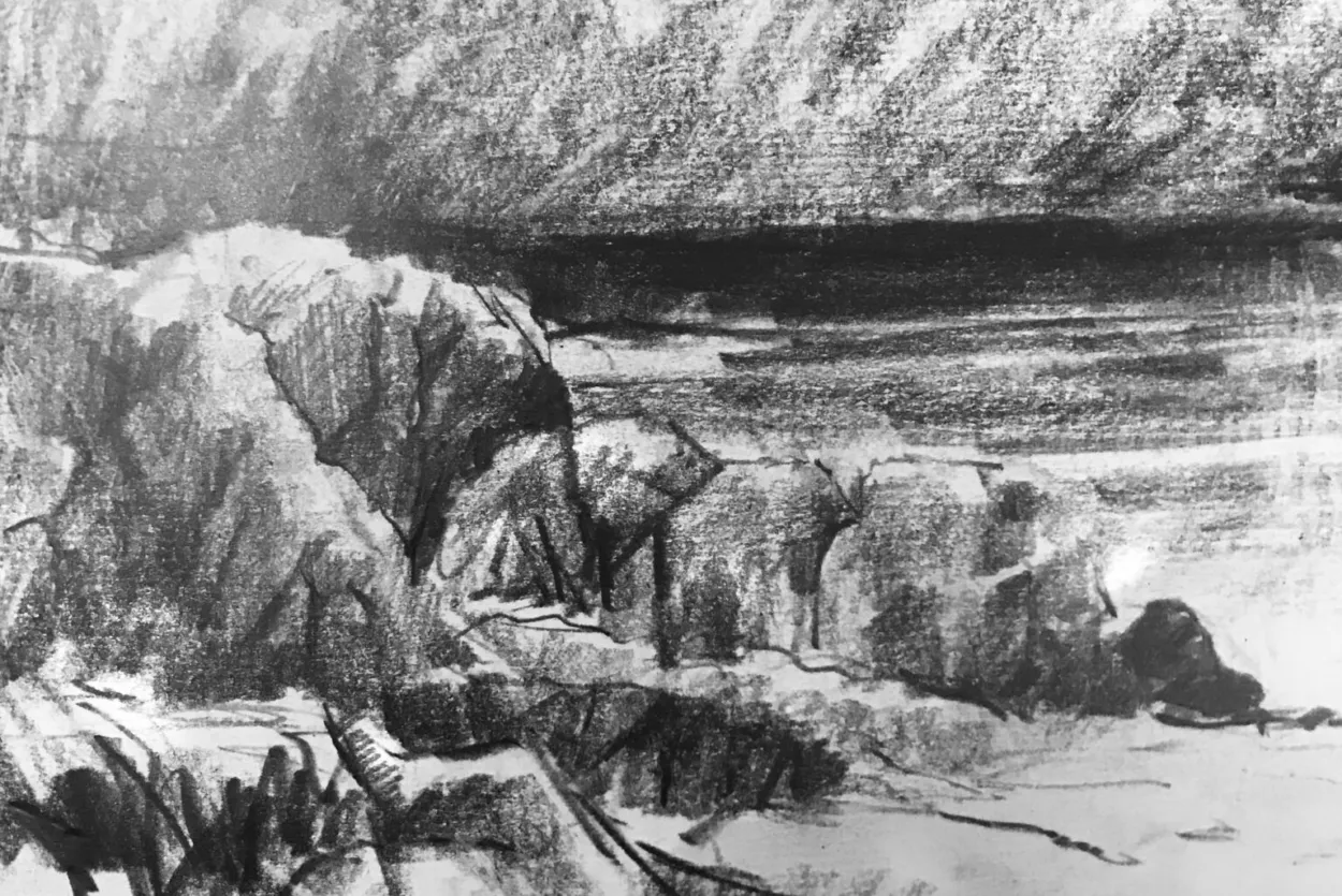 Charcoal drawing of rocks on a beach