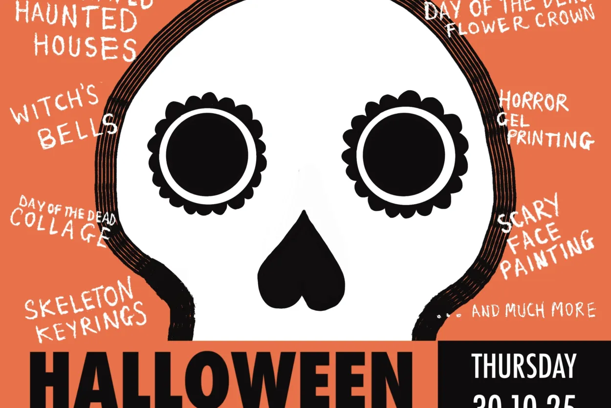 Day of the dead decorated skulls on an Orange background.