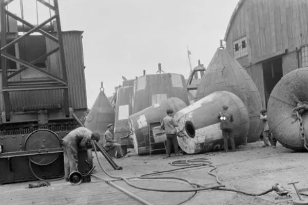 People working on Buoys at wharf