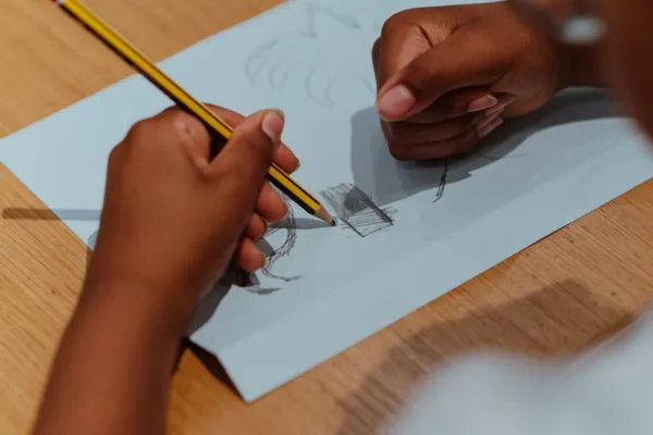 Child drawing in Learning Studio