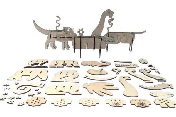 Wooden dinosaurs body parts laid on a table