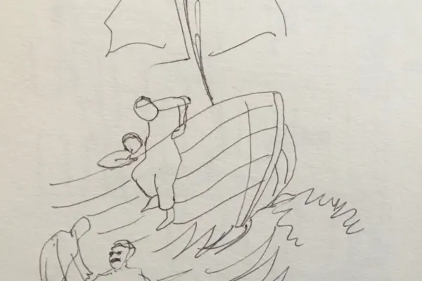 Man climbing out of boat